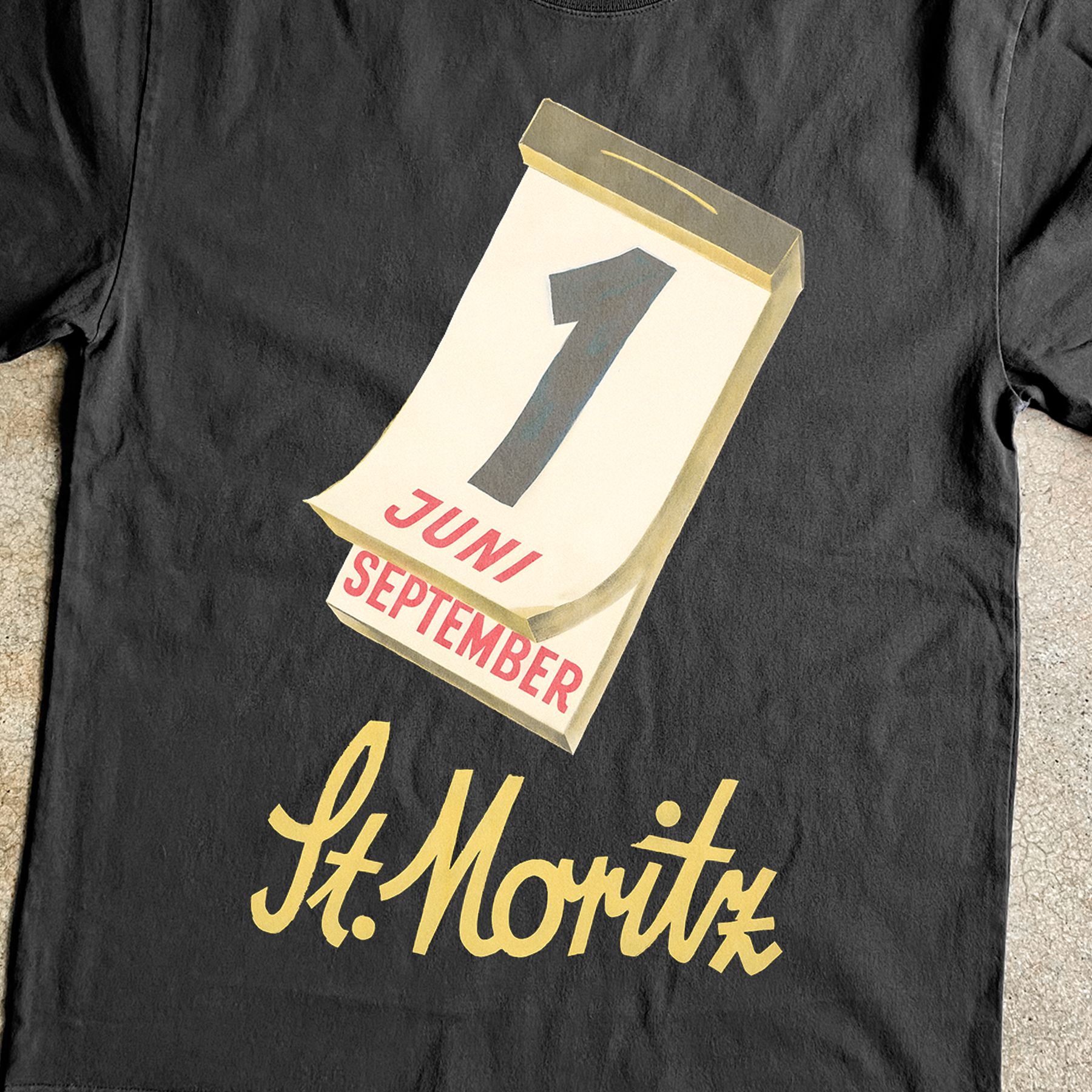'ST MORTIZ' CALENDAR BLACK TEE